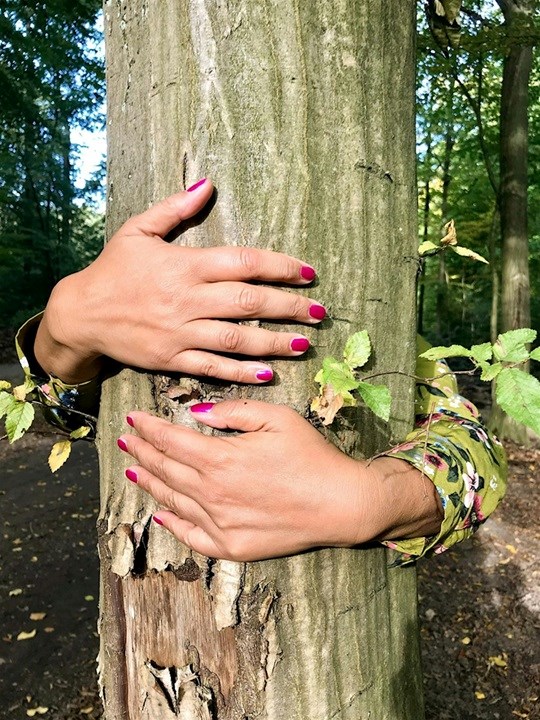 0b7ba9a5-c118-4ea3-9e5d-0540093c1344-Forest Bathing arms around tree.jpg